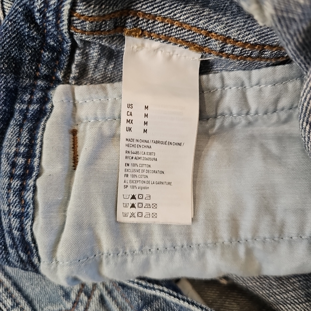 Classic Denim Jacket with Red Floral Detail - Picture 10 of 12